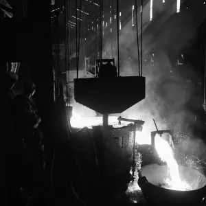 Molten steel is tapped off from one of the open hearth furnaces at the Stocksbridge Molten steel is tapped off from one of the open hearth furnaces at the Stocksbridge