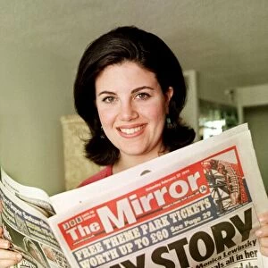 Monica Lewinsky at home July 1999 reading Daily Mirror