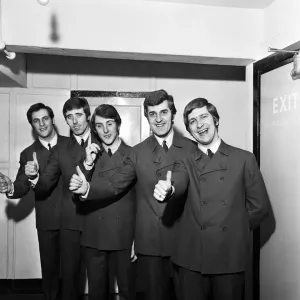 The Moody Blues, give a thumbs up after learning that they are Top of the Pops