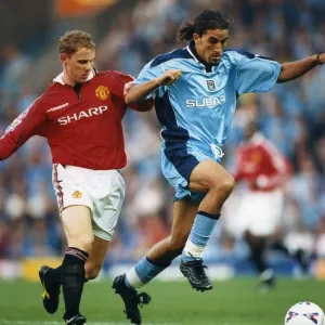 Moroccan-born Sky Blues player Moustapha Hadji and Manchester Uniteds Nicky Butt Moroccan-born Sky Blues player Moustapha Hadji and Manchester Uniteds Nicky Butt