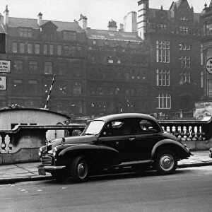 Morris Minor parked in Crosshall Street, Liverpool, with opposing street signs