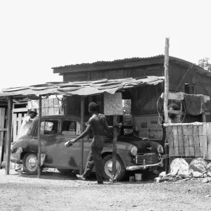 A Morris Oxford Repair Print, Kingston, Jamaica 1963 A Morris Oxford Repair Print, Kingston, Jamaica 1963