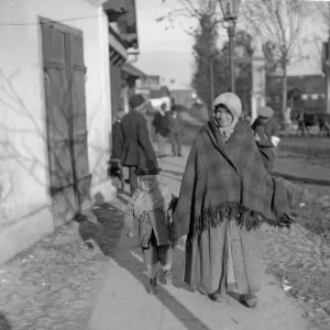 Mother and child in traditional dress seen here in the village of Halicz, in Galicia Mother and child in traditional dress seen here in the village of Halicz, in Galicia