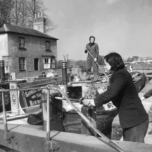 Mother and daughter Captain and crew of a Canal Boat near Kings Langley between London Mother and daughter Captain and crew of a Canal Boat near Kings Langley between London