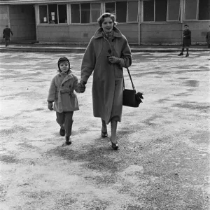 Mother dropping her son off at the South Mead School, Southfield, Wimbledon Mother dropping her son off at the South Mead School, Southfield, Wimbledon