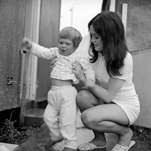 A mother with her two year old boy toddler. December 1969 Z11890