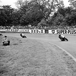 Motor Cycle Racing at oulton Park. A bunch of bikes at Old Hall corner during