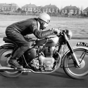 A motor cyclist at speed on a section of the Sidcup by-pass, Kent A motor cyclist at speed on a section of the Sidcup by-pass, Kent