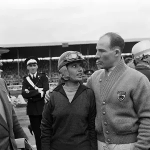 Motor racing at Silverstone. Stirling Moss expressing his sympathies to Maria Teresa de Motor racing at Silverstone. Stirling Moss expressing his sympathies to Maria Teresa de