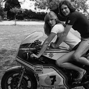 Motorcycle champion Barry Sheene at home with 1976 girlfriend Stephanie McClean