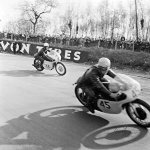 Motorcycle road racers competing in the 50cc Ultra-Lightweight Class at Brands Hatch