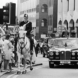 mounted policemen escort the Lord Mayors car at the head of the 1985 Coventry carnival