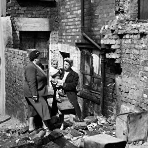 MP Bessie Braddock meeting residents in a Liverpool slum housing area