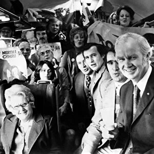 MP Gwynfor Evans pictured with his supporters on the train bound for London
