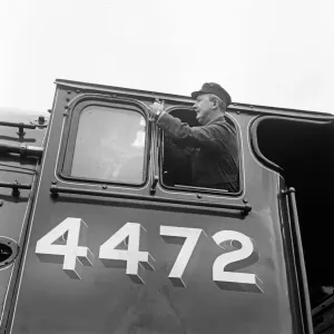 Mr Alan Pegler pictured cleaning The Flying Scotsman Engine window of the drivers cabin Mr Alan Pegler pictured cleaning The Flying Scotsman Engine window of the drivers cabin
