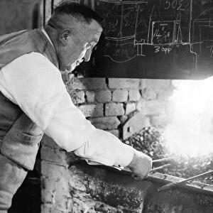 Mr. Charlton Amos, blacksmith, at his forge in Heddon-on-the-Wall