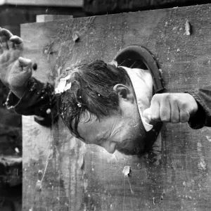 Mr Doug Chapman of the Hastings Arms, Seaton Delaval in the stocks for charity on 31st