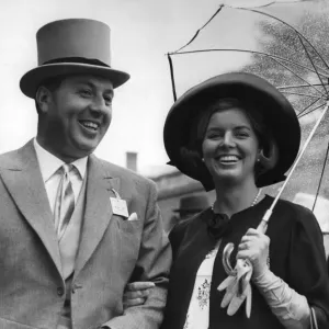 Mr. Doug Ellis, the Birmingham travel agent, and his wife at Ascot yesterday. Mrs Mr. Doug Ellis, the Birmingham travel agent, and his wife at Ascot yesterday. Mrs