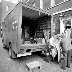 Mr. Edward Heaths baby grand piano is removed from No. 10 Downing Street. After Mr