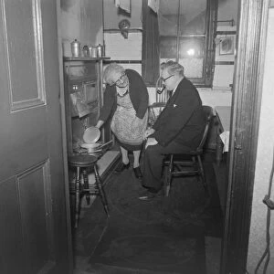 Mr Herbert Morrison stops for the night at the home of Mrs Lottie Bacon during his