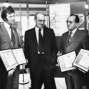 Mr Jack Jones (centre) after he had presented National Savings awards to the four Mr Jack Jones (centre) after he had presented National Savings awards to the four