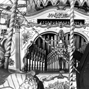 Mr. James Crowe with the renovated Verbeck organ at Whitley Bay fairground in August 1976