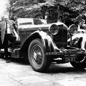 Mr James MacHarg Print, a photograph of a man with a Bentley