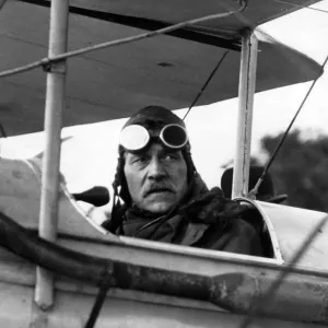 Mr Ramsay MacDonald in the aeroplane in which he flew to London on urgent State business Mr Ramsay MacDonald in the aeroplane in which he flew to London on urgent State business