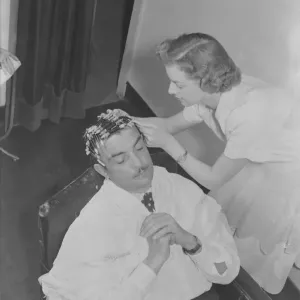 Mr Raymond, hair stylist has new poodle cut'7 / 3 / 1951 Cole Staff