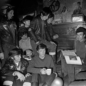 Mr. Ted Wood of Birch, near Manchester reads the Bible to Hell Angels Club during a