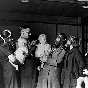 Mr Watkins and family being fitted with their gas masks at the guildhall in Kingston Upon