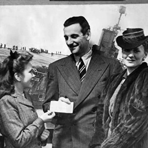 Mr Webster Booth and Miss Anne Ziegler (right) receiving a cheque for £