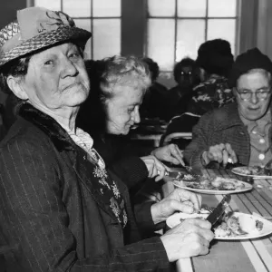 Mrs Agnes Efferman, from Marion Street, Splott, Cardiff tucks into her one Mrs Agnes Efferman, from Marion Street, Splott, Cardiff tucks into her one