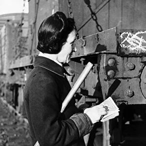 Mrs Christina Axworthy the first woman wagon examiner on the railway. WW2 1943