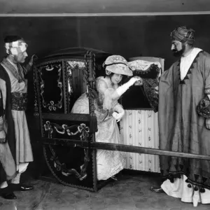 Print of Mrs Fagan arriving in a sedan chair carried by two artists Print of Mrs Fagan arriving in a sedan chair carried by two artists