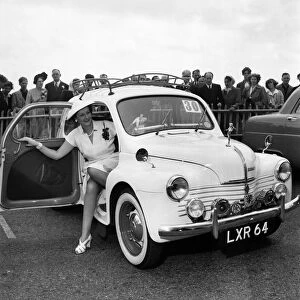 Mrs. Gordan Offord poses in a car during the Brighton beauty contest. July 1952 C3554