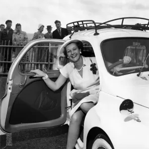 Mrs. Gordan Offord poses in a car during the Brighton beauty contest