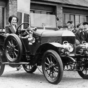 Mrs Kay Petre behind the wheel of a 1913 Morris Bullnose Tourer Print