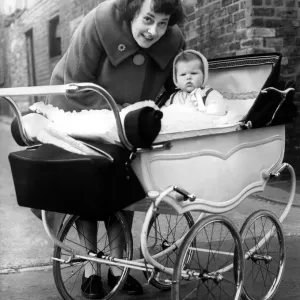 Mrs L Jackson with Susan in a pram, 23rd March 1961 Print Mrs L Jackson with Susan in a pram, 23rd March 1961 Print
