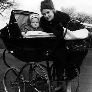 Mrs M Milburn with Grandson in High Pram Print (1961) Mrs M Milburn with Grandson in High Pram Print (1961)