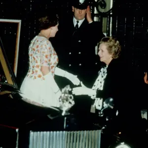 Mrs Margaret Thatcher greets Queen Elizabeth II on her arrival at 10 Downing Street to