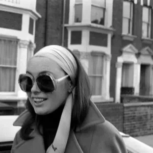 Black and white print of a woman leaving her home Black and white print of a woman leaving her home