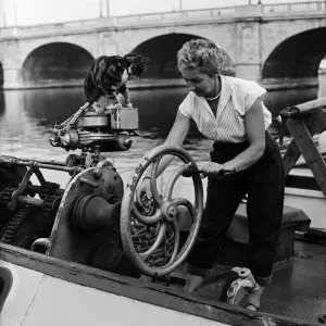 Mrs Tepper on her boat Cornelia with cat Sinbad, Print 1955 Mrs Tepper on her boat Cornelia with cat Sinbad, Print 1955