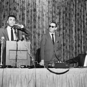 Muhammad Al in a press conference leading up to his bout with Ernie Terrell Muhammad Al in a press conference leading up to his bout with Ernie Terrell