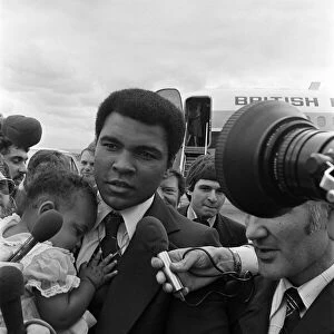 Muhammad Ali arrives at Teesside Airport with his family. July 1977