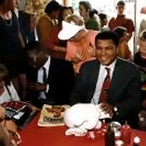 Muhammad Ali (Cassius Clay) Boxer with 2 young boxers suffering from brain damage