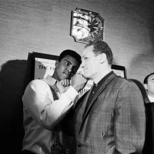 Muhammad Ali (Cassius Clay) and Henry Cooper at a press conference ahead of their Muhammad Ali (Cassius Clay) and Henry Cooper at a press conference ahead of their