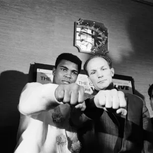 Muhammad Ali (Cassius Clay) and Henry Cooper at a press conference ahead of their Muhammad Ali (Cassius Clay) and Henry Cooper at a press conference ahead of their