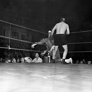 Muhammad Ali falls during his exhibition bout at the Royal Albert Hall London England