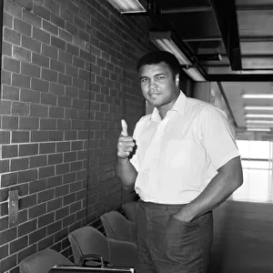 Muhammad Ali at Heathrow Airport London before his departure to Los Angeles